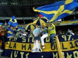 YOKOHAMA, JAPAN - DECEMBER 14: Boca Juniors fans enjoy the atmosphere during the European-South American Cup club soccer championship match between Boca Juniors and AC Milan at the Yokohama International stadium December 14, 2003 in Yokohama, Japan. (Photo by Koichi Kamoshida/Getty Images)